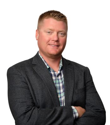 Portrait of Drew Glaser, REALTOR®.